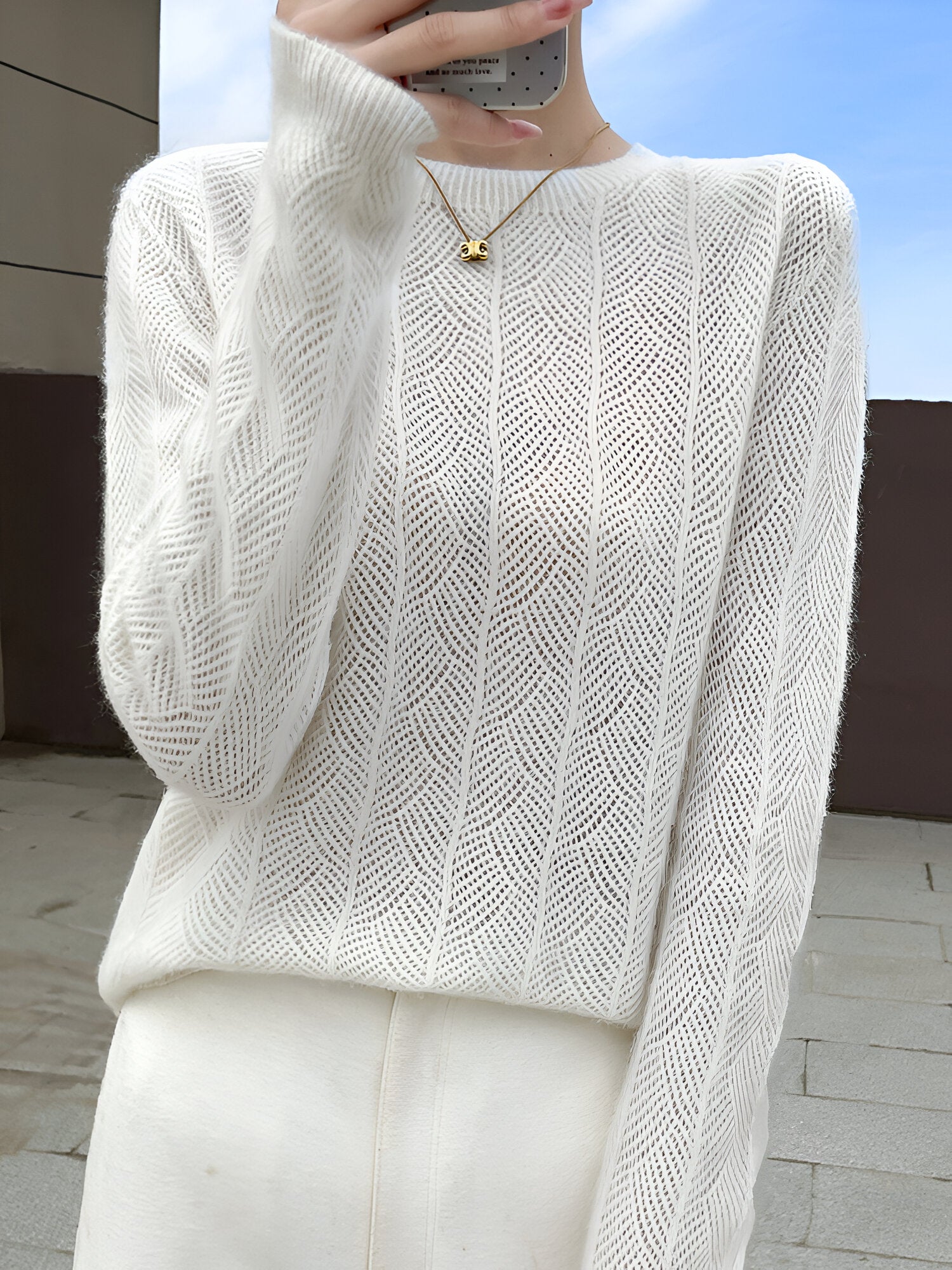 Mika™ - Merino wool sweater with elegant cutouts