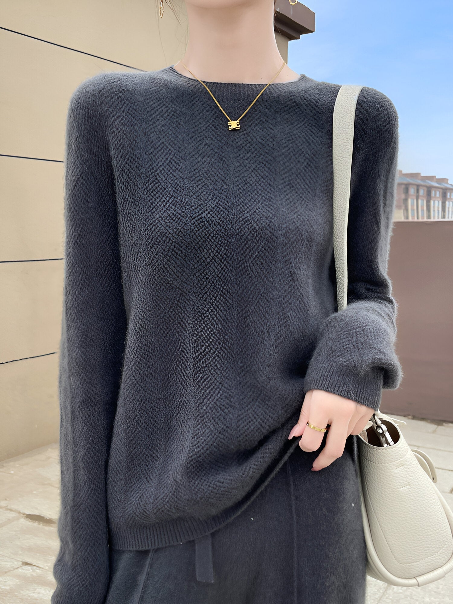 Mika™ - Merino wool sweater with elegant cutouts