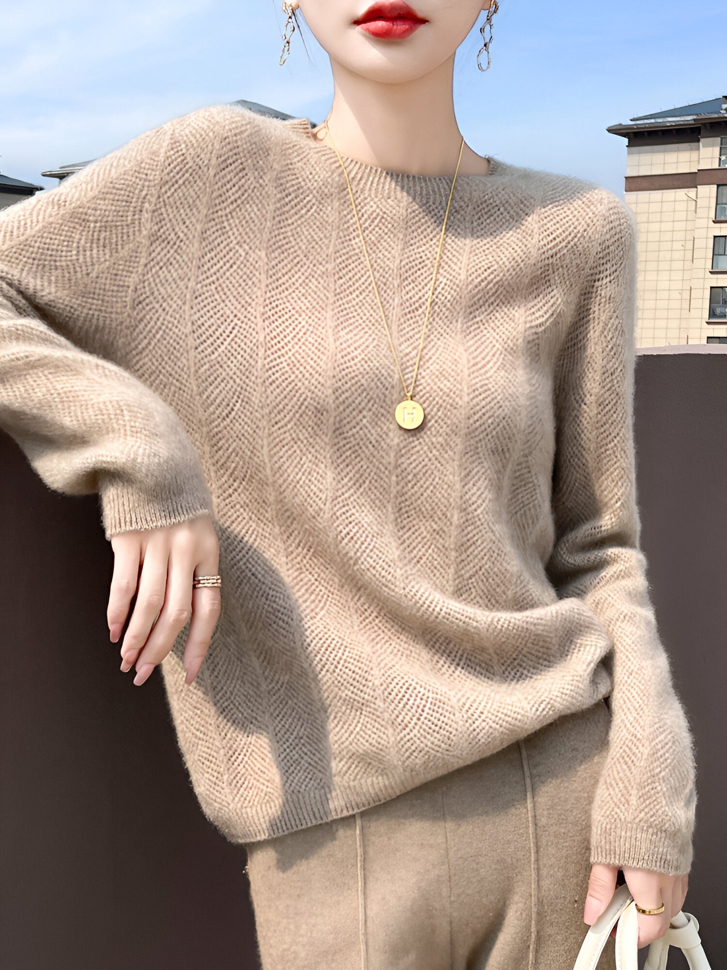 Mika™ - Merino wool sweater with elegant cutouts