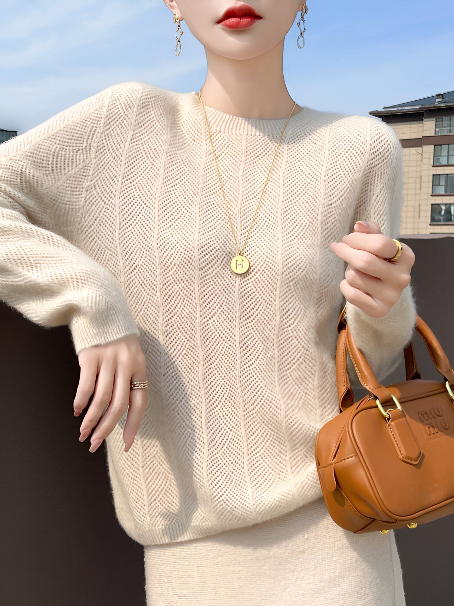 Mika™ - Merino wool sweater with elegant cutouts