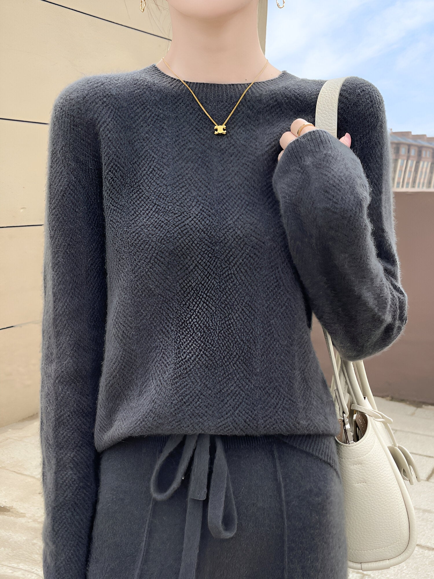 Mika™ - Merino wool sweater with elegant cutouts